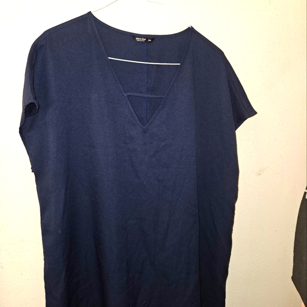 Deep blue dress by Shein. V cut opening in the front. Mid length.